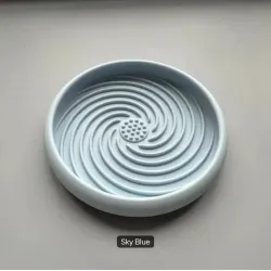 Silicone spiral design slow feeder or licky mat in a choice of colours.